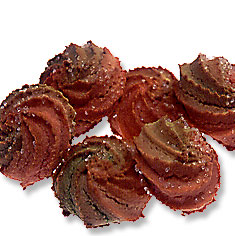Amaretti - soft chewy almond cookies topped with festive pink and green colored peanuts.