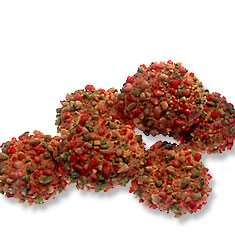 Amaretti - soft chewy almond cookies topped with festive pink and green colored peanuts.