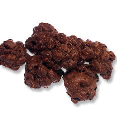 Roccoco are light, cruchy chocolate merengue cookies with whole hazelnuts and almonds.