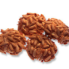 Pignoli are soft chewy almond cookies topped with pignoli nuts.