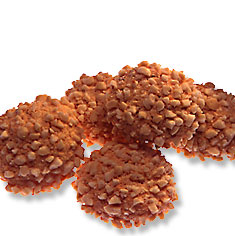 Amaretti - soft chewy almond cookies topped with chopped peanuts.